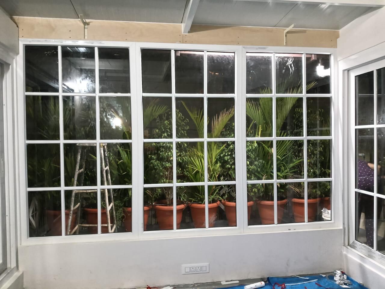 Classic White Georgian Grid French Windows Overlooking Garden