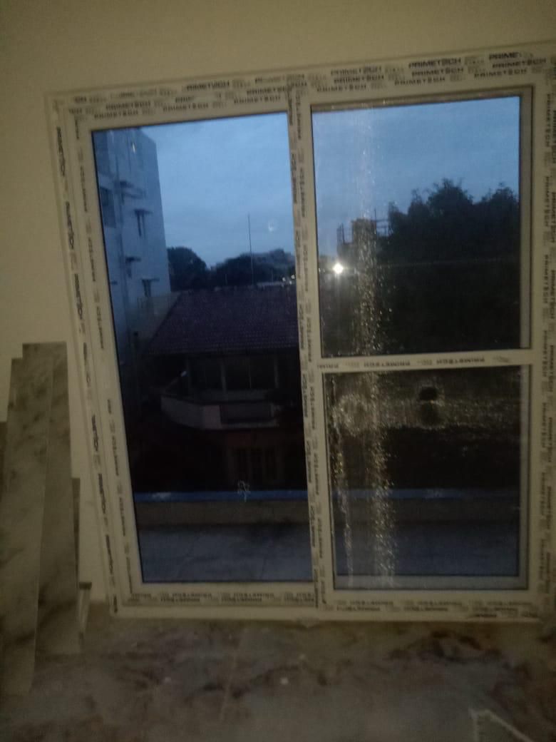 Panoramic Terrace Balcony Sliding Glass Doors at Dusk