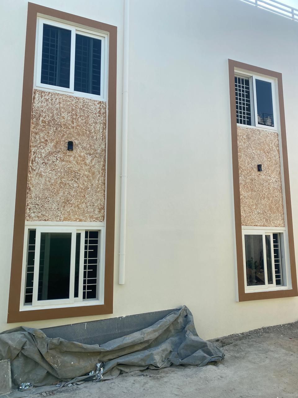 Villa Elevation with Full-Height Dual uPVC Windows and Cladded Columns