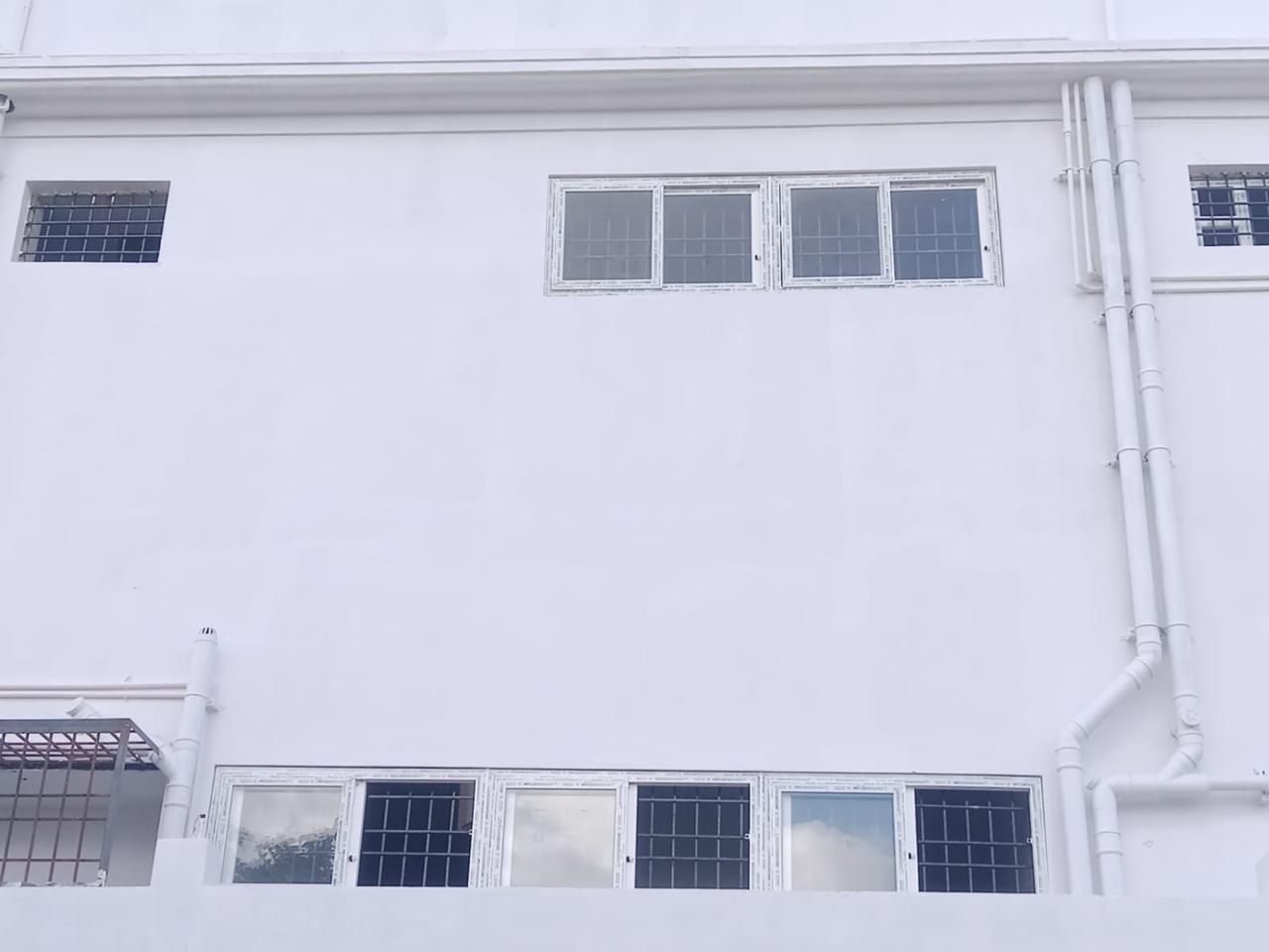 Close-Up of Multi-Panel Horizontal uPVC Sliding Window System on White Facade