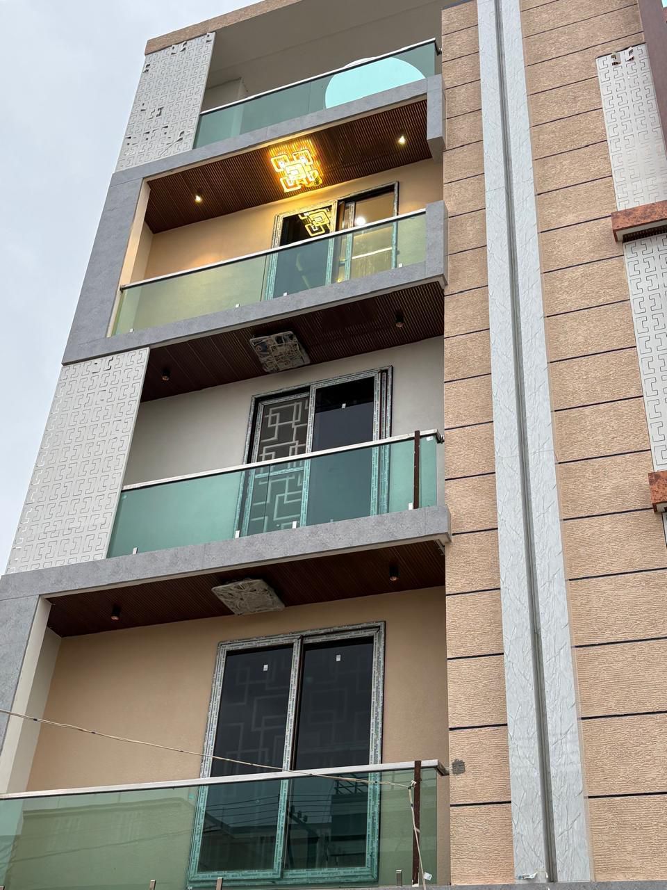 Luxury Multi-Level Balconies Featuring Sliding Glass Doors and False Ceiling Lights